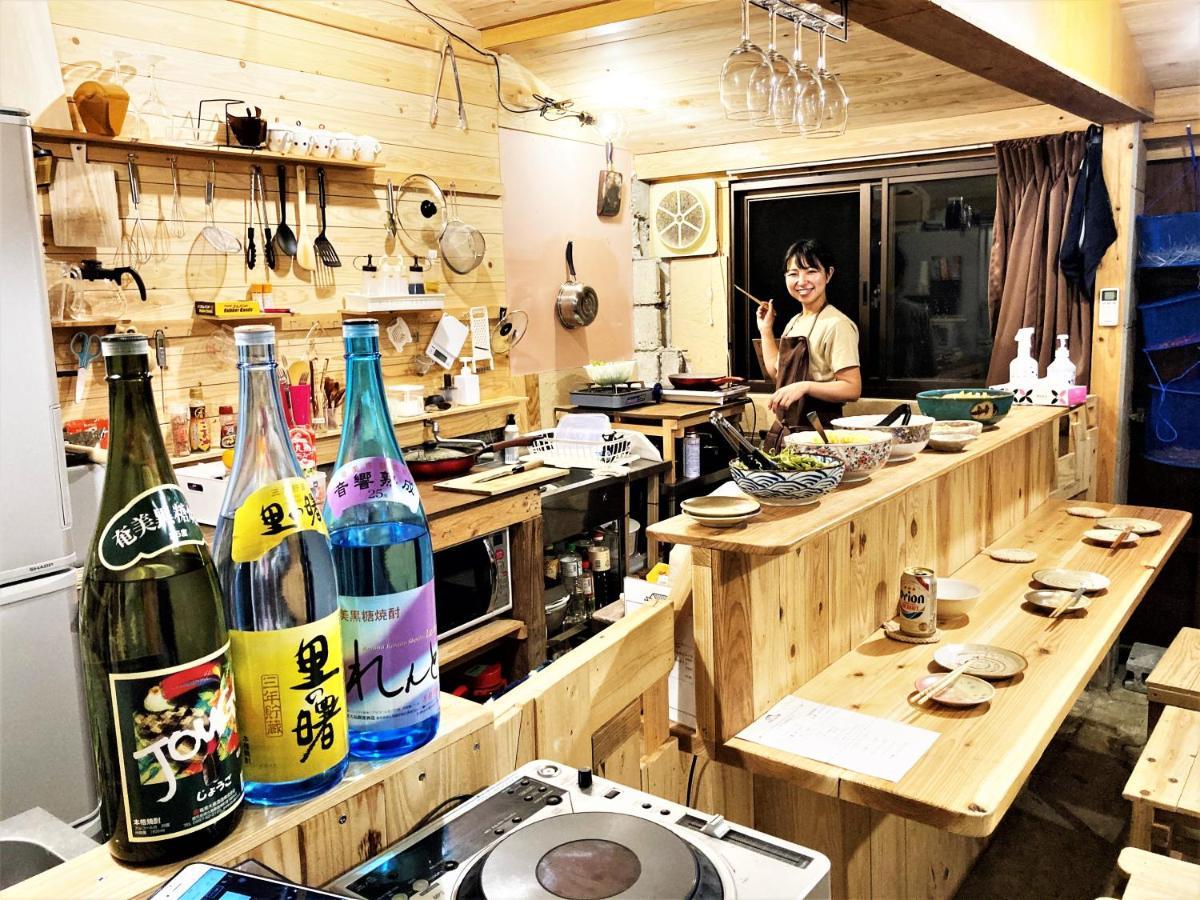 奄美ゲストハウス Hub A Nice Inn Setouchi  Eksteriør billede