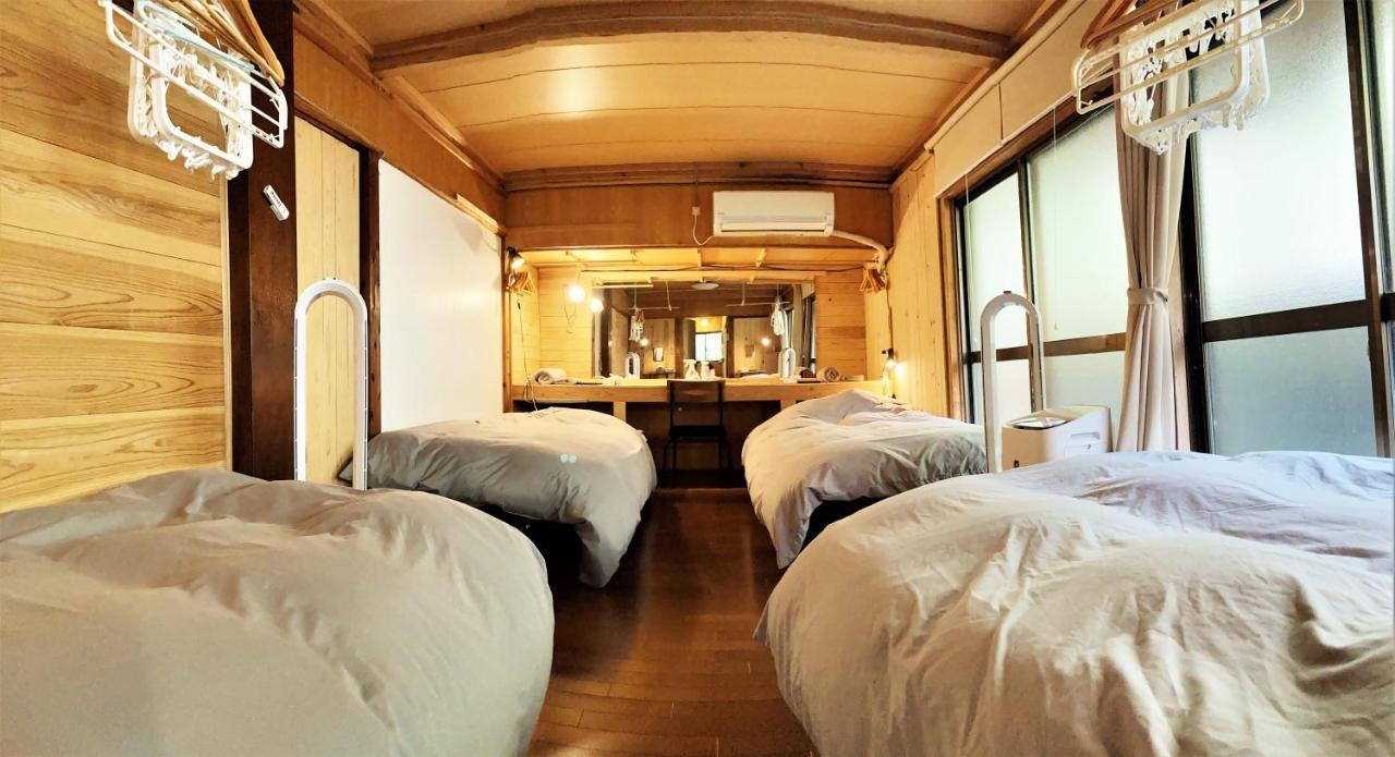 奄美ゲストハウス Hub A Nice Inn Setouchi  Eksteriør billede
