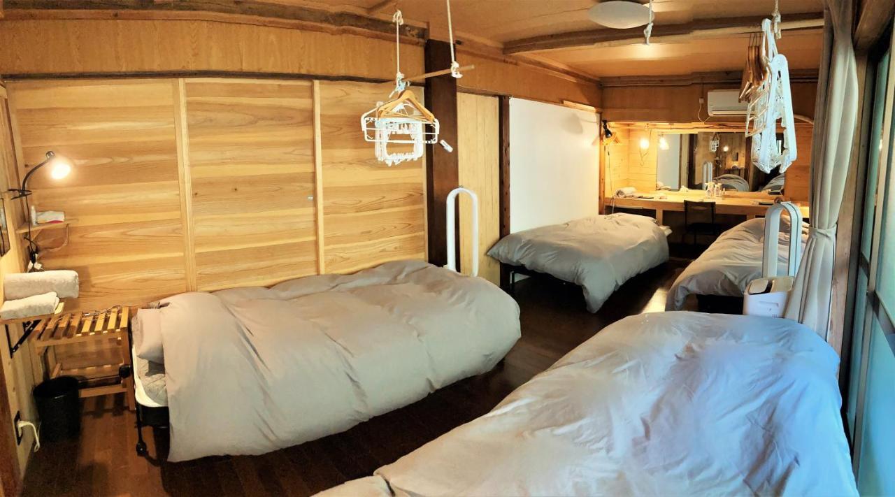 奄美ゲストハウス Hub A Nice Inn Setouchi  Eksteriør billede