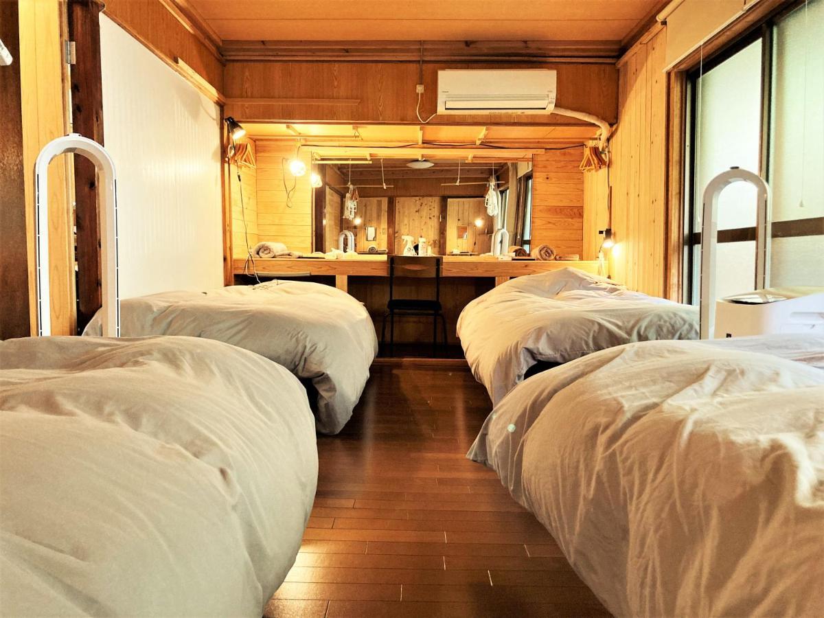 奄美ゲストハウス Hub A Nice Inn Setouchi  Eksteriør billede