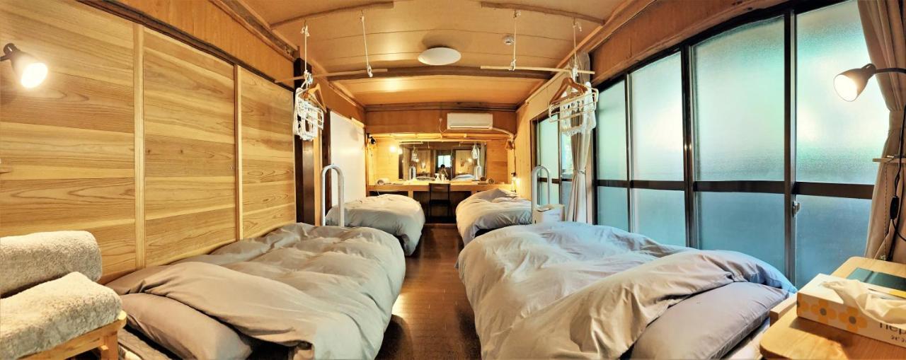 奄美ゲストハウス Hub A Nice Inn Setouchi  Eksteriør billede